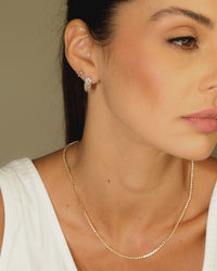 Colar Riviera Cristal Dourado combinada com outras peças