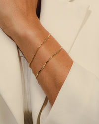 Pulseira Trilha de Mini Círculos Dourada
